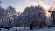 Snow coats swaths of the Northeast as clipper storm heads east