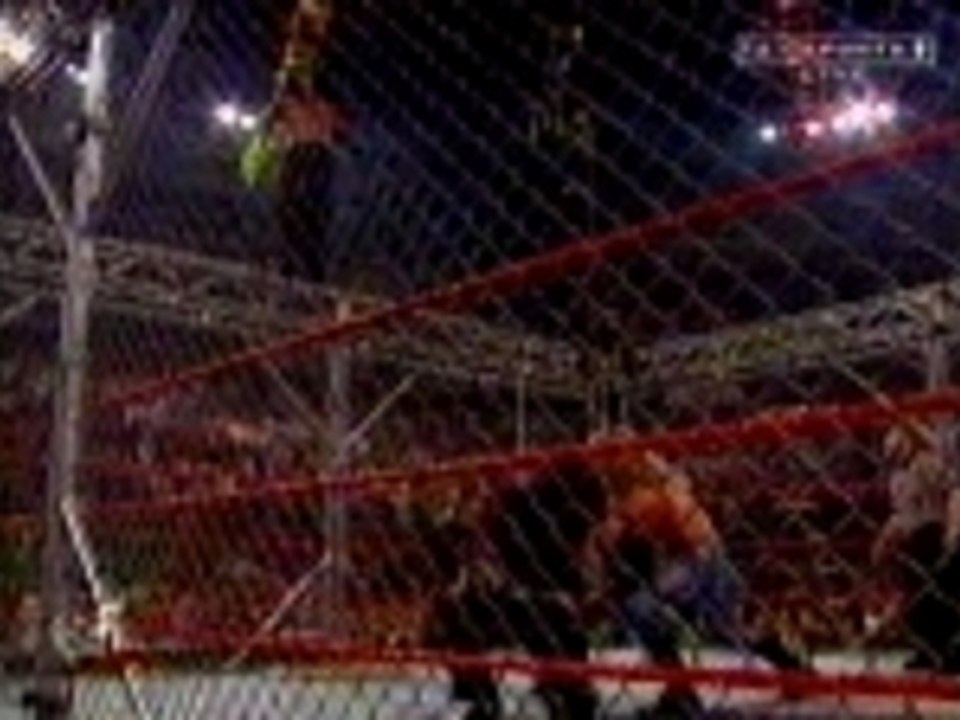 WWE - Jeff Hardy does a Dragon Attack off the cage