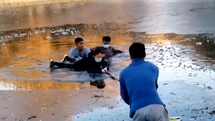 Young girl rescued from frozen lake by university students in northwest China