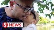 Singaporean father reunites with son after two years