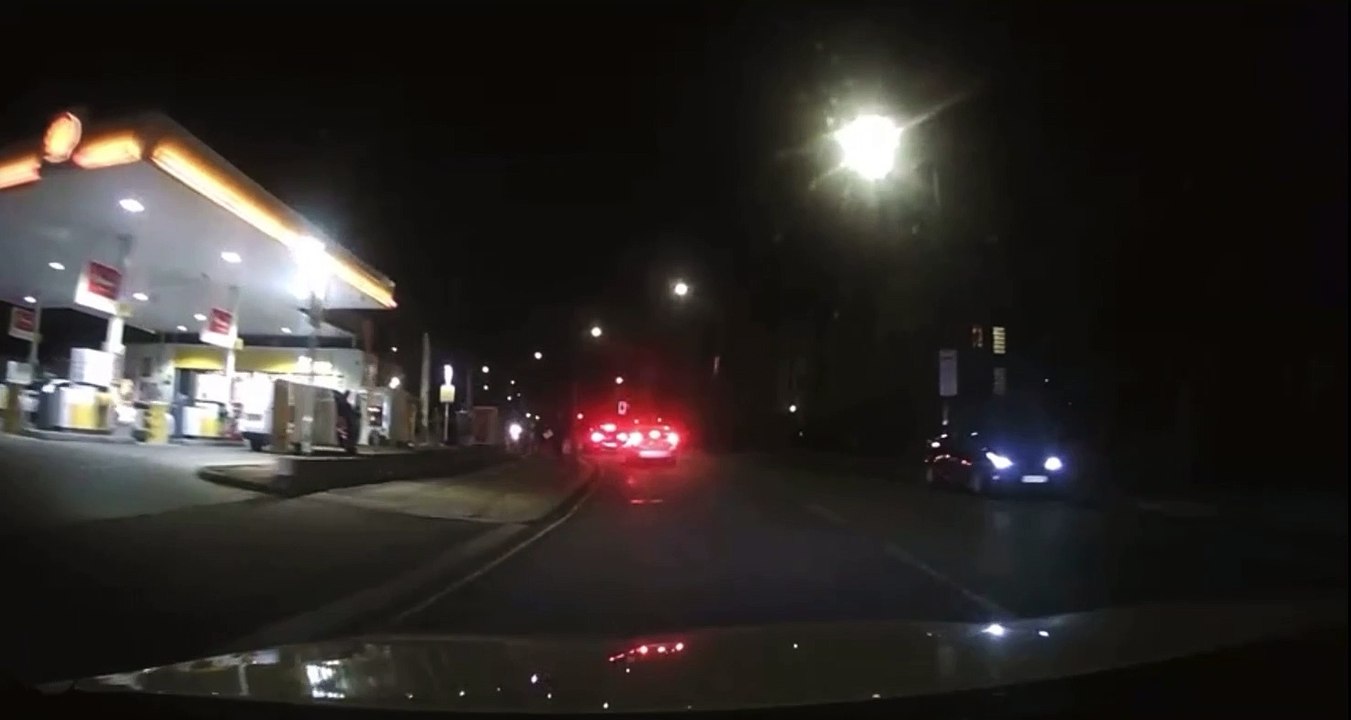 Man Struggles with Moped