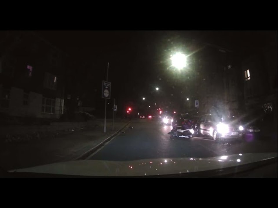 Man Struggles with Moped