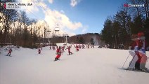 Skiing Santas hit the slopes in Maine