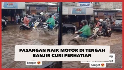 Pasangan Naik Motor di Tengah Banjir Curi Perhatian, Warganet: Iri Meronta
