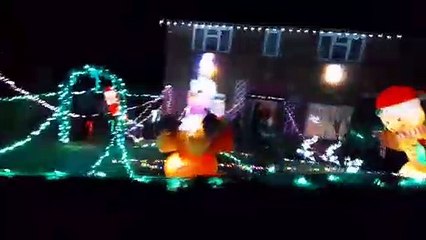 Christmas lights and inflatable characters in Balcombe