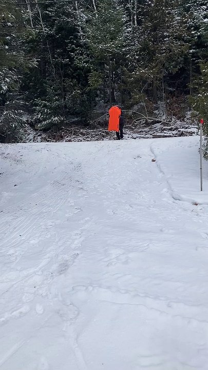 Sled Slides Over Edge