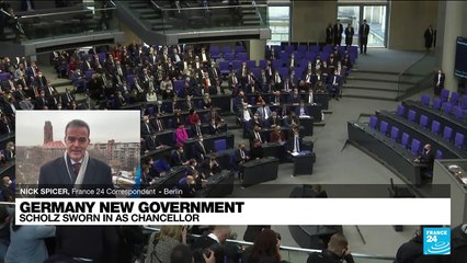 Scholz takes reins from Merkel for new German era