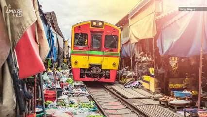 This Huge Train Goes Through a Market in Thailand 8 Times a Day