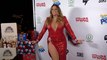 Carrie Turrubiartes attends the 8th Annual Winter Wonderland Toys for Tots charity event red carpet in Los Angeles
