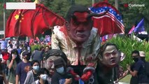 Filipino protesters destroy Duterte effigy at march in Manila