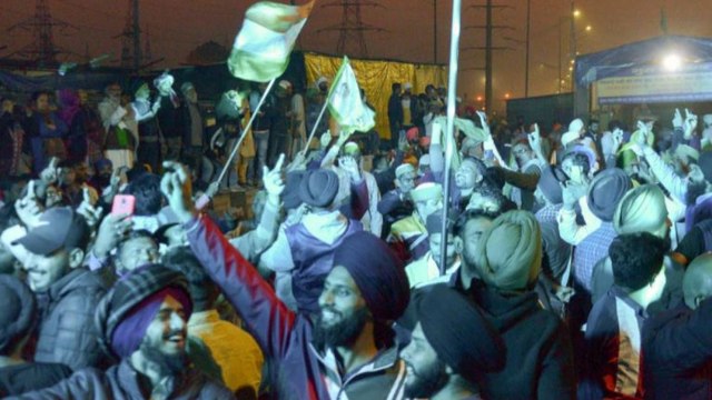 Farmers celebrate at Delhi border as they end their protest