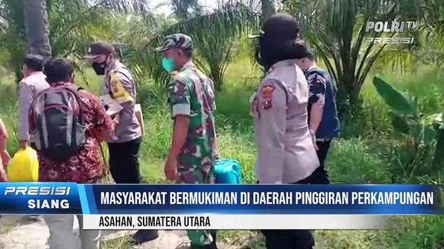 Percepat Vaksinasi, WakaPolres Asahan Bersama Personil Naik Sampan ke Desa Padang Mahondang