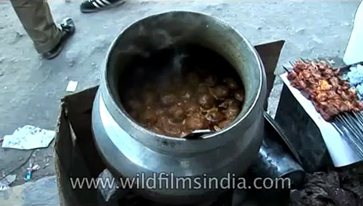 Vendor selling famous street food Rista-gushtaba of Kashmir