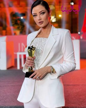 إطلالات مميزة لرضوى الشربيني بالبدلة