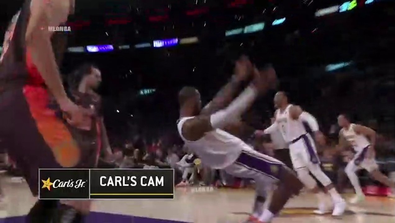 LeBron keeps himself from falling off balance