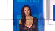 VOICI - Kim Kardashian pose en maillot échancré ultra-moulant et c’est perturbant