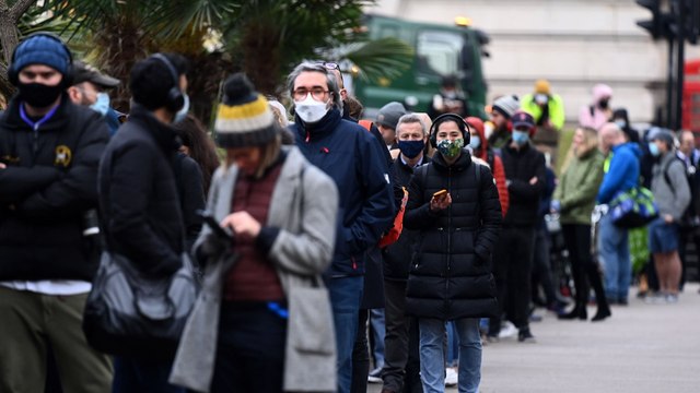 First death linked to Omicron in UK as China records its first case of the coronavirus variant