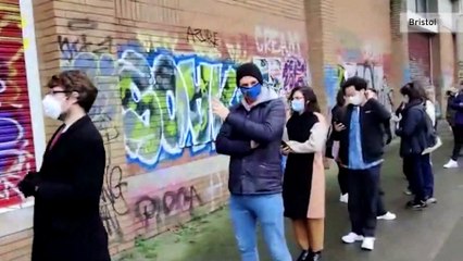 Queues fo vaccines build around the UK's street corners and buildings