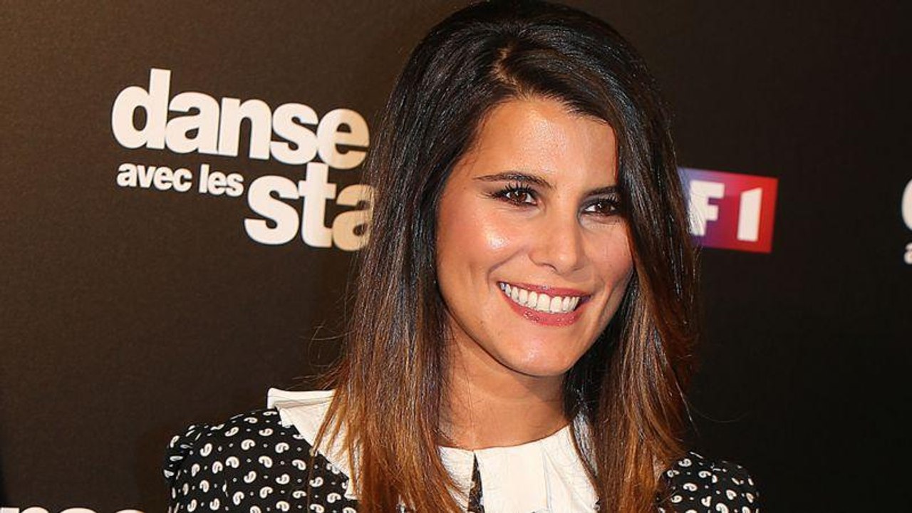 VOICI Karine Ferri tatoue « des mots doux » sur la main de son fils Maël