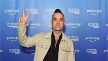 VOICI - Robbie Williams : Sa fille de 6 ans souhaite sa mort !