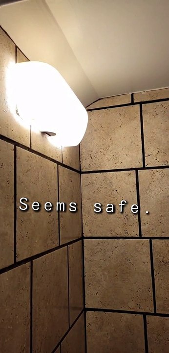 Light Fixture Found in Shower Stall