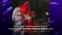 Pria Papua Ngebut Sambil Kibarkan Bendera Bintang Kejora