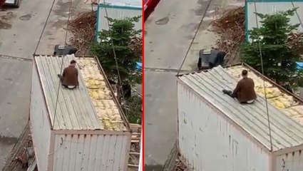 Konteynerle birlikte havalanan işçinin zor anları kameralarda