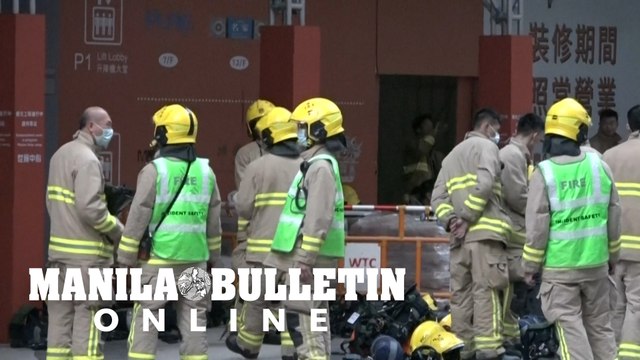 Firefighters at Hong Kong tower where hundreds trapped by fire