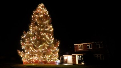U.K. Couple’s Massive Christmas Tree Lights Entire Village