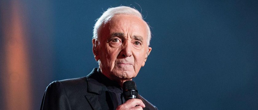 GALA VIDEO - Charles Aznavour : absent aux obsèques de Johnny Hallyday, comment il lui a rendu hommage à sa façon