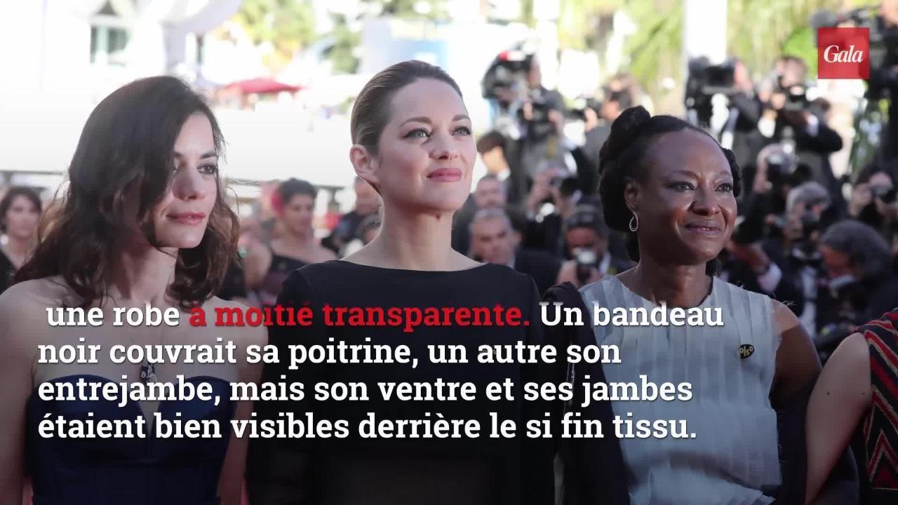 GALA VIDEO - À Cannes, la robe trans­pa­rente osée de Marion Cotillard