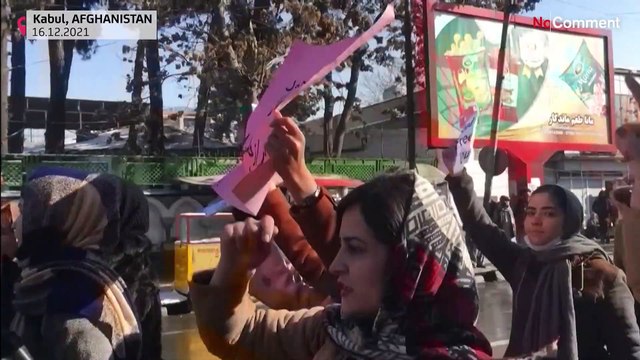 Afghan women call for rights and aid in Taliban-approved march