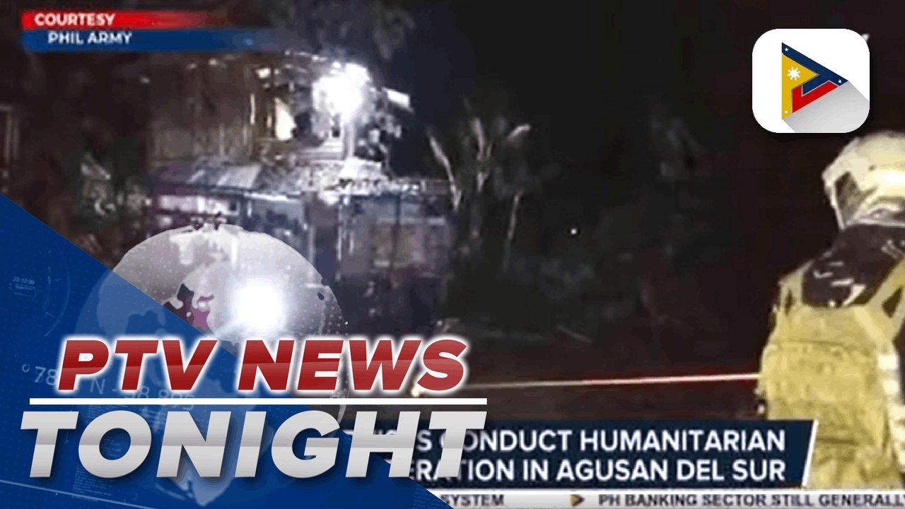 Rescue workers work tirelessly to evacuate residents at the height of Typhoon Odette's onslaught in many parts of Visayas and Mindanao