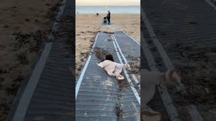 Kid Running to Sea Takes Early Dip