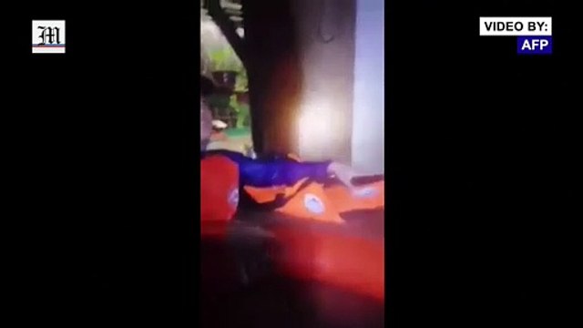Philippines: Rescuers help trapped residents as typhoon triggers flooding