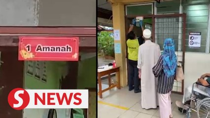 Signage with the word ‘Amanah’  covered up in Sarawak polling centre