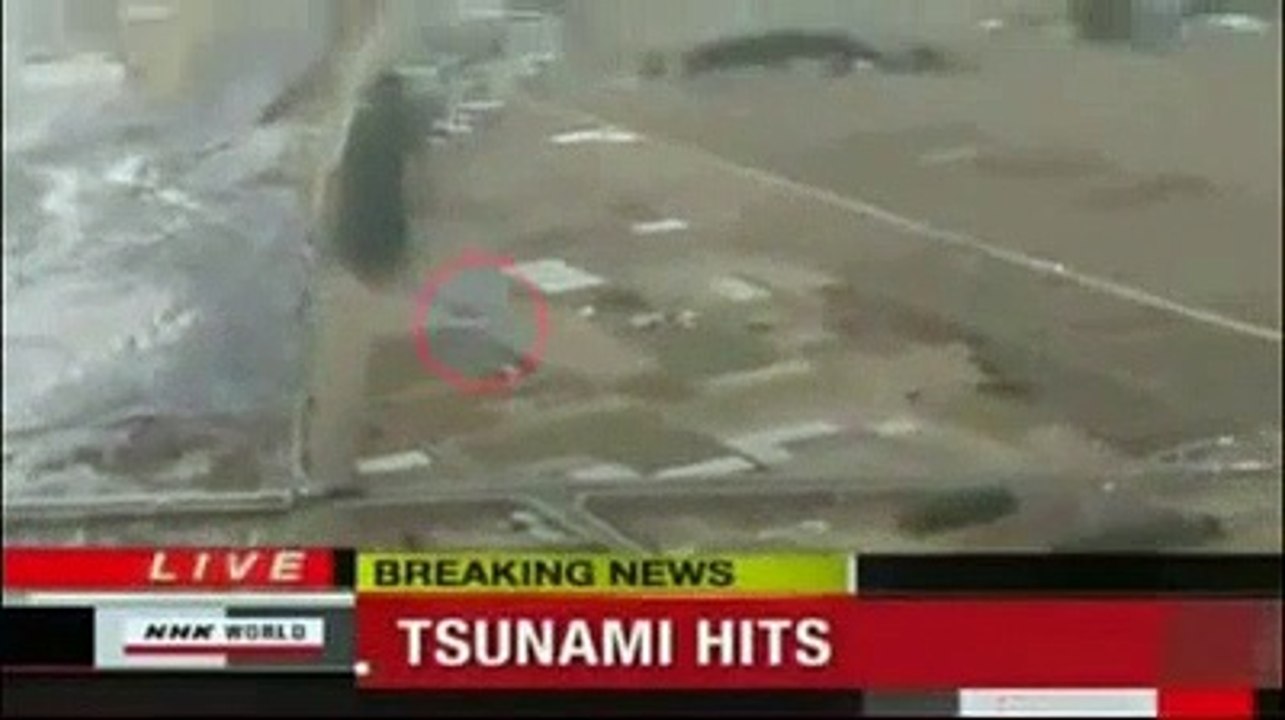 Shocking footage of a UFO over Tsunami wave in JAPAN  11.03.2011