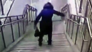 woman fall down a flight of stairs