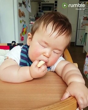 Baby literally falls asleep while eating snack