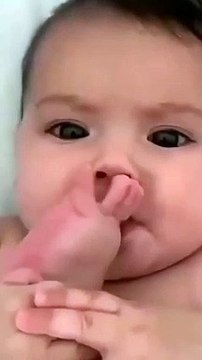 Cute Baby Feeding Milk From Its Feet.....