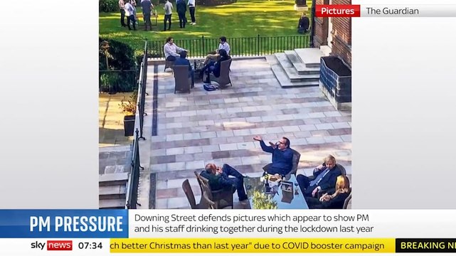 Dominic Raab defends Downing St photo, saying 'They're all in suits'