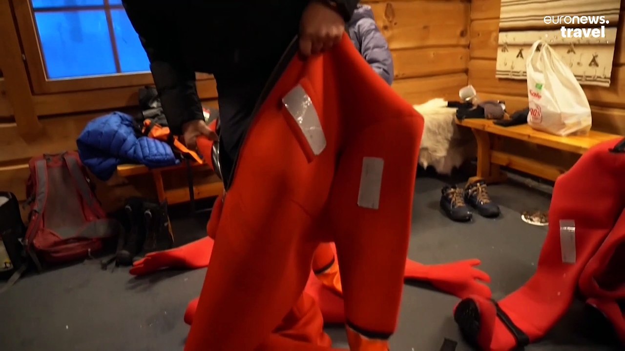 Arctic Ice Floating: Would you brave a swim in a frozen lake in Lapland?