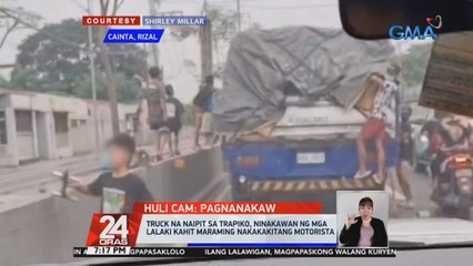 Truck na naipit sa trapiko, ninakawan ng mga lalaki kahit maraming nakakakitang motorista | 24 Oras