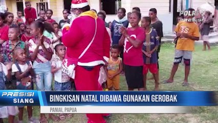 Kapolsek Napan Berikan Bingkisan Natal Kepada Anak-Anak Sekolah Minggu di Napan, Papua