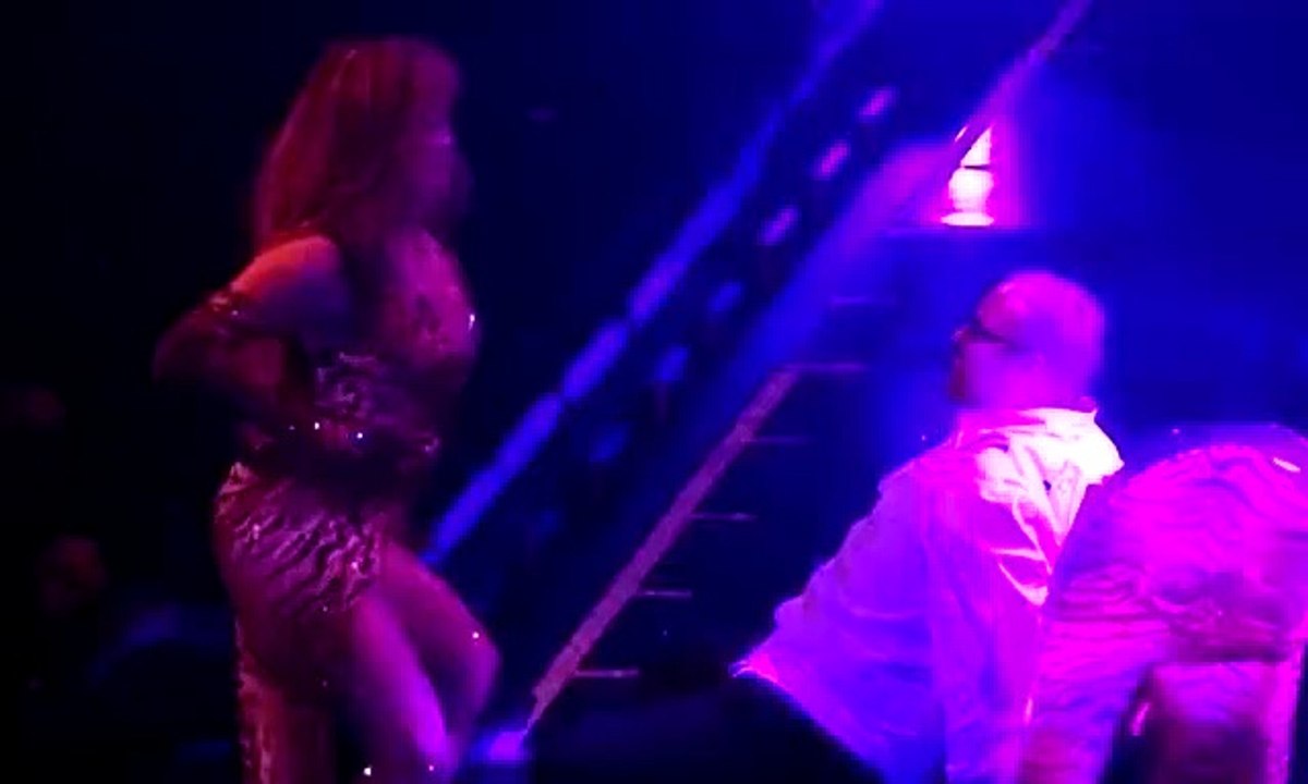Jennifer Lopez gives sensual lap dance at LA opener of her tour
