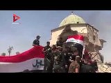 رفع العلم العراقي على مسجد «خلافة داعش» بعد تحرير الموصل