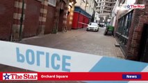 Police activity near Orchard Square on Christmas Eve