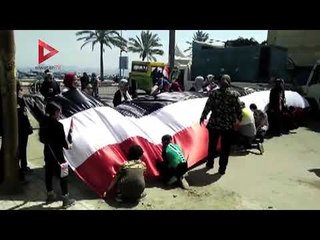 مسيرة بعلم مصر أمام مدرسة الأنفوشي الثانوية بالإسكندرية