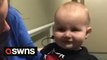 Deaf nine-month-old boy hears his mum and dad for the first time after surgery