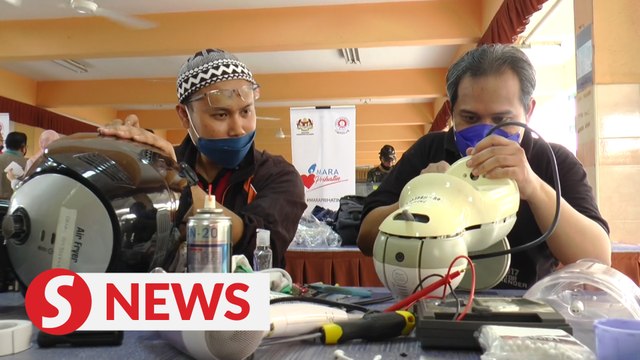 Technical college staff repairs flood-damaged electrical appliances for free